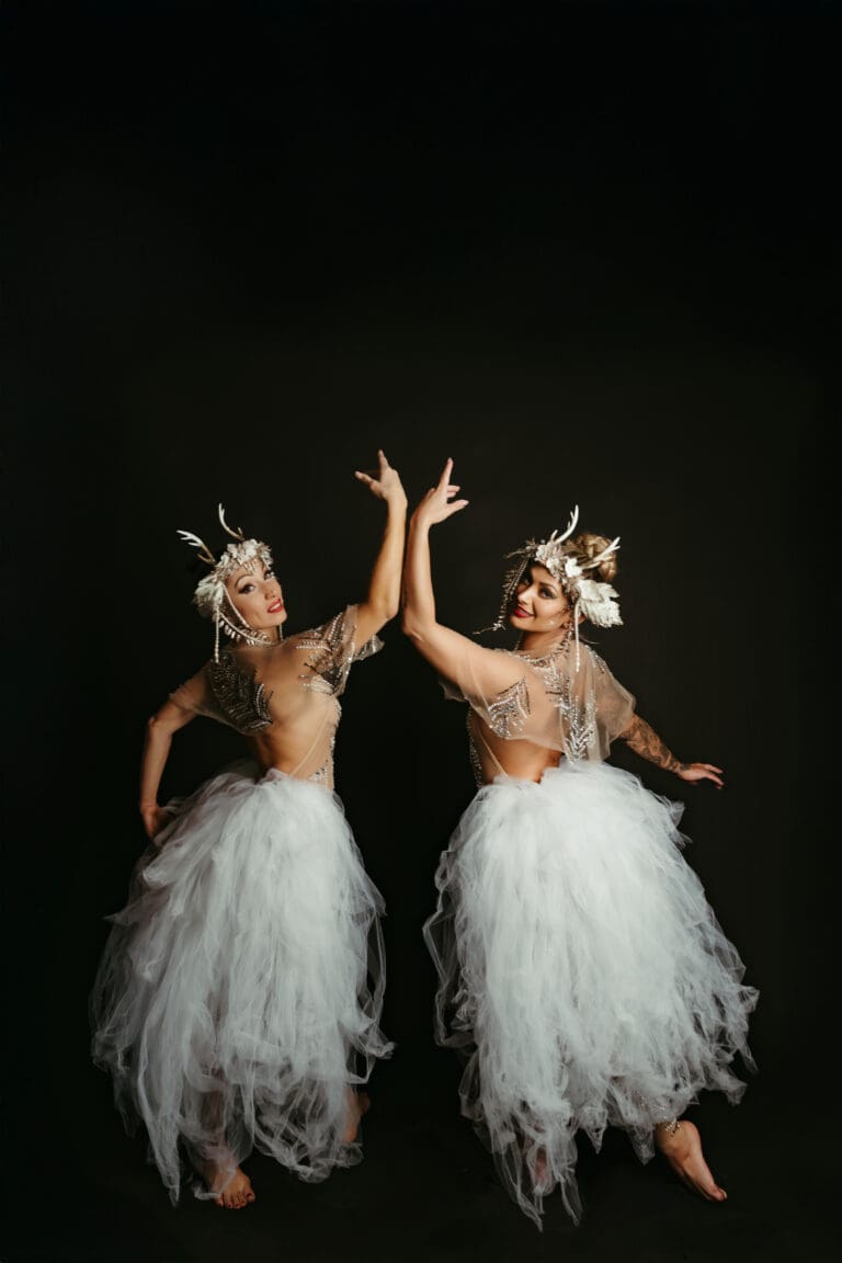 pearl creative two women in white dresses