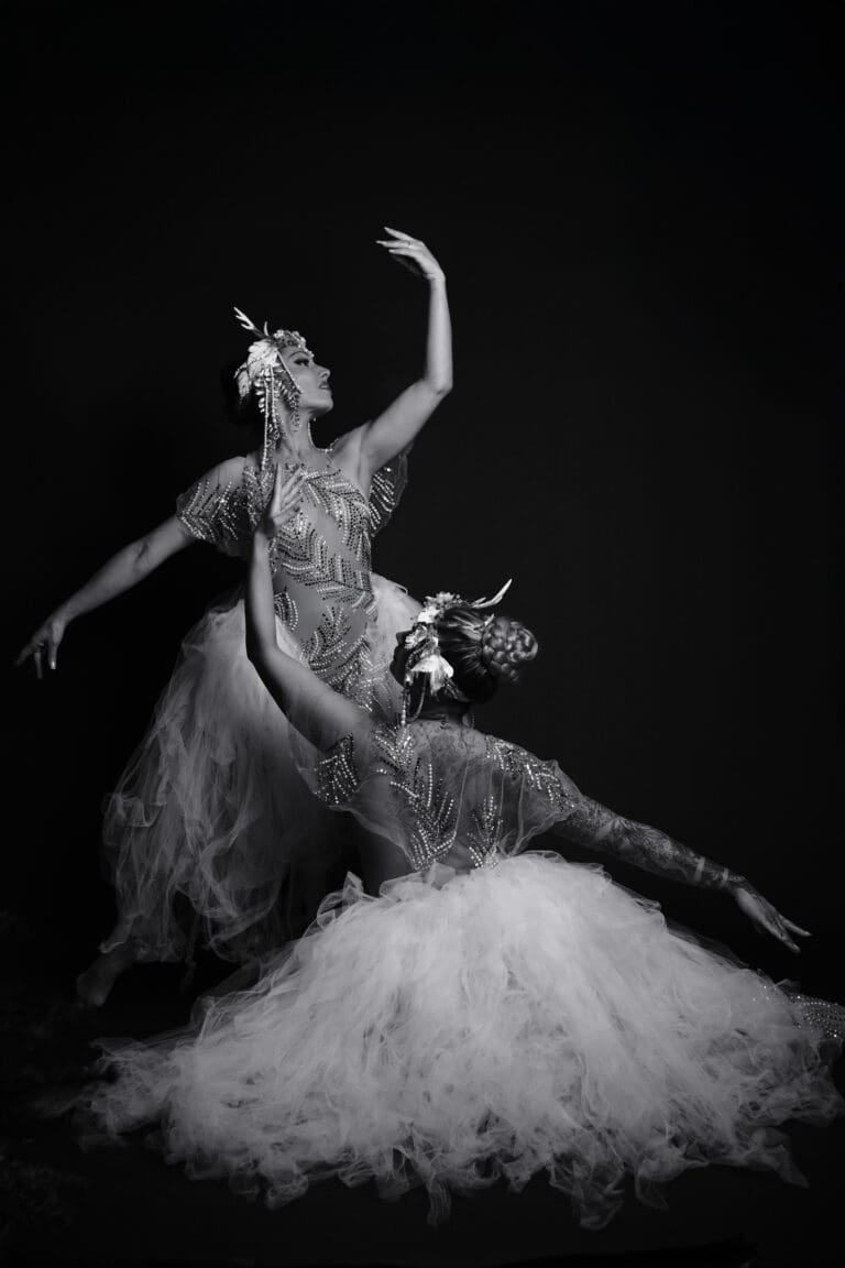 pearl creative two women in a white garment in black and white